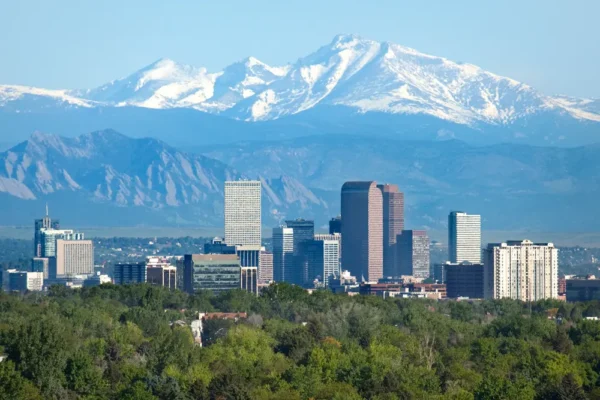 Beautiful view of downtown Denver, Colorado with the backdrop of the Rocky Mountains.
